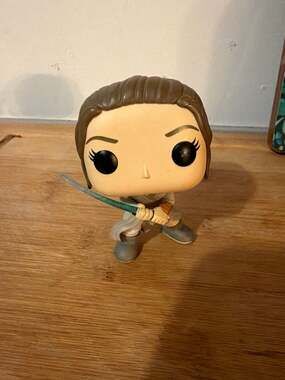 Funko POP! Star Wars: The Force Awakens - Rey with Lightsaber #104